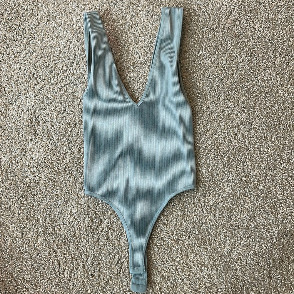 Low cut bodysuit very soft worn once
